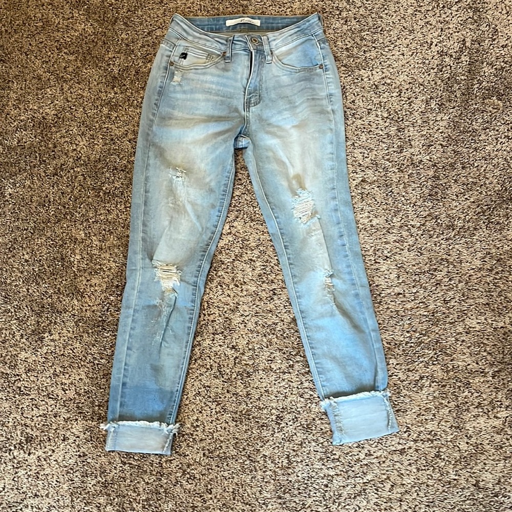 Woman’s Distressed Denim Jeans